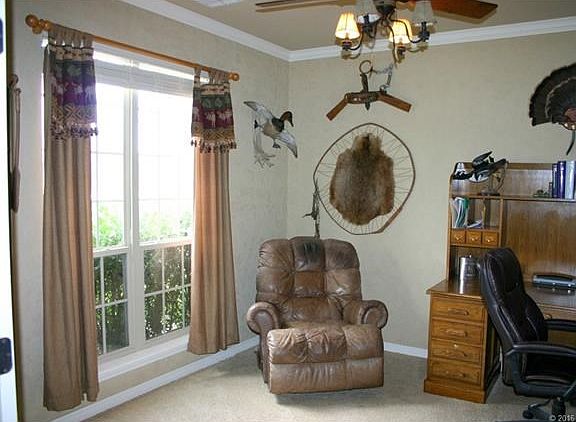 Front office off entry with French doors.