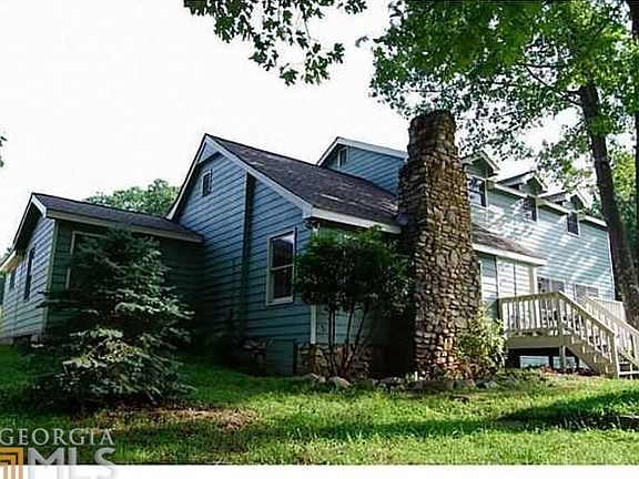 Incredible mountain views from this 12 acre lot! New roof!
