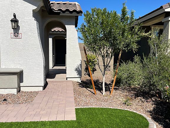 Entrance to private courtyard with landscape, and the single front door.