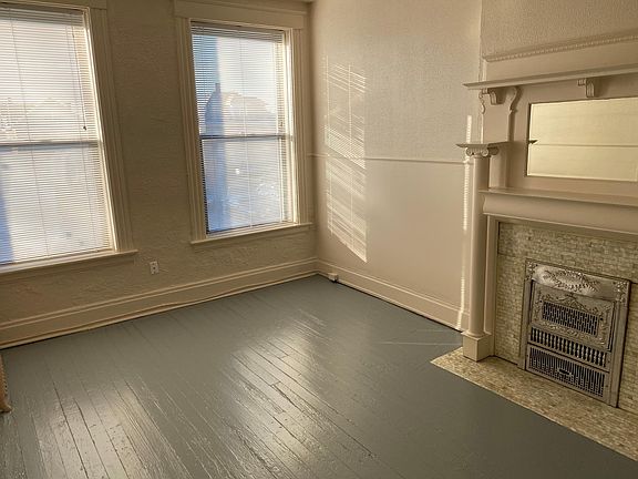 Sunny Charming Living Room with Large Windows