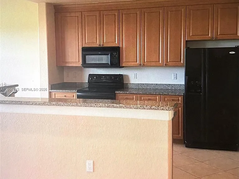 7993 NW 128th Ln #13-B — Photo 4