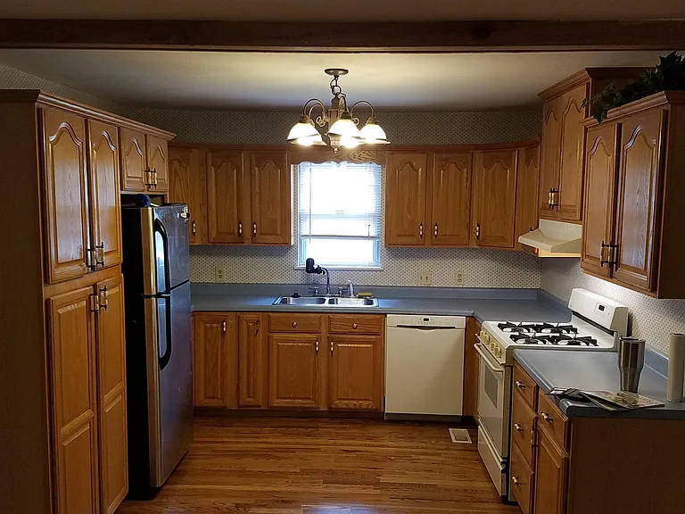 Kitchen with new stove to come.