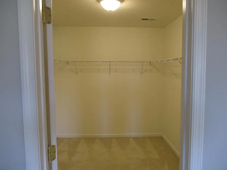 Large walk in closet in owner's bedroom