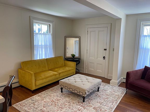 Living room w/Front entrance