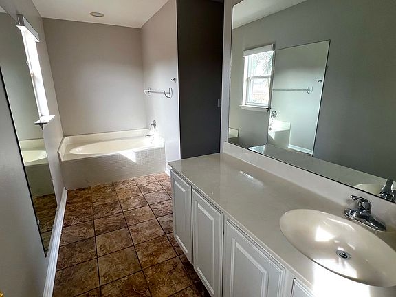 Master Bathroom with Sunken Tub