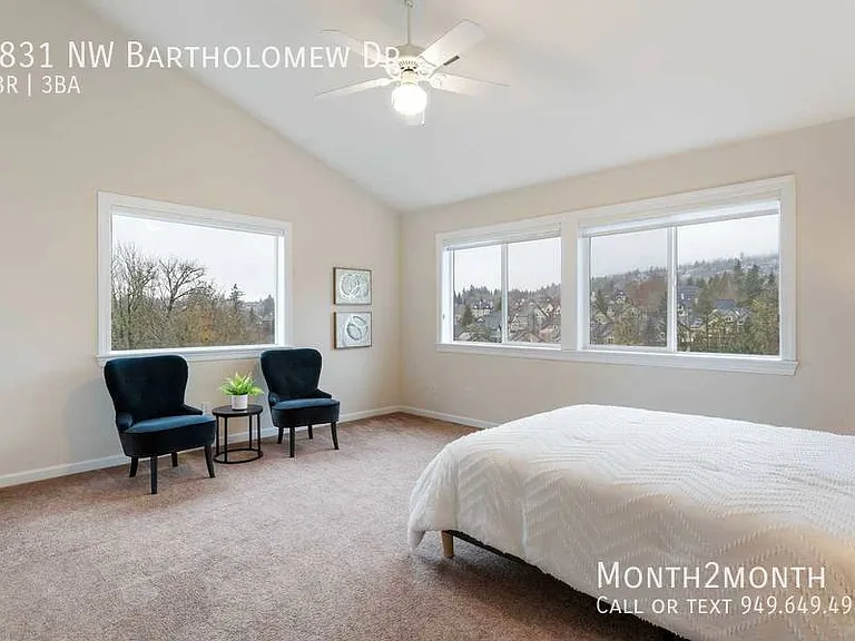 9831 NW Bartholomew Dr — Photo 18
