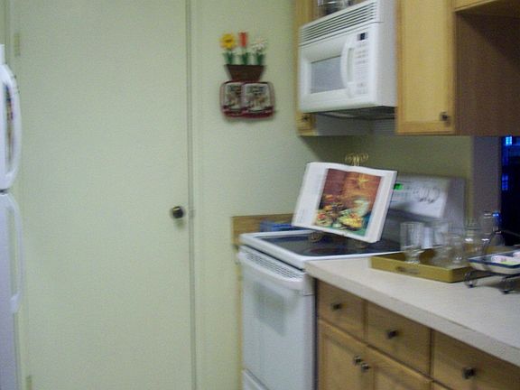 Pass Thru Kitchen Leading To Seperate Dining area and Living Room