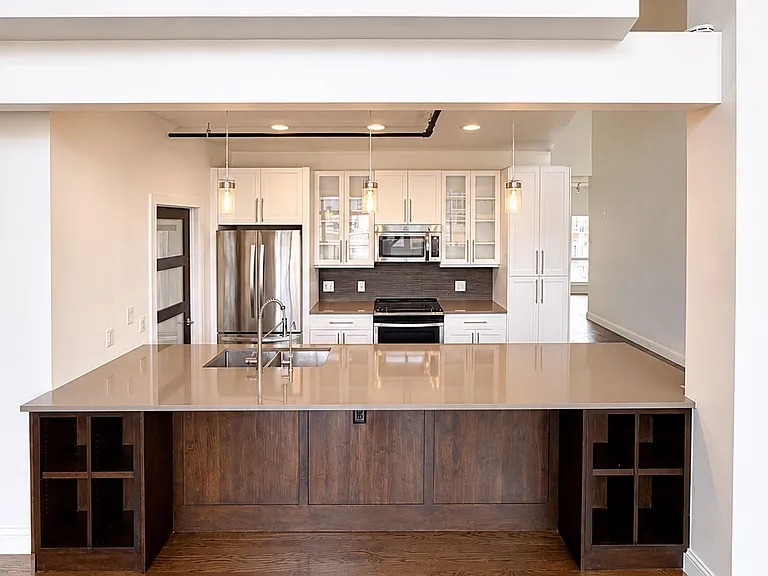 Modern kitchen with ample cabinetry, generous counter space, and updated finishes.