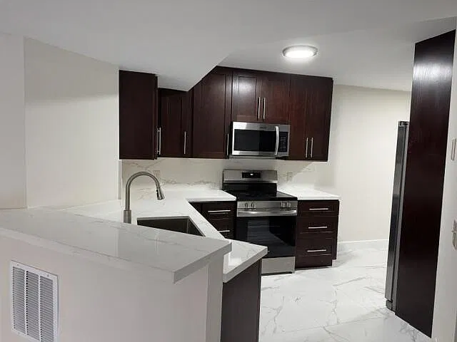 8801 Wiles Rd — Photo 3