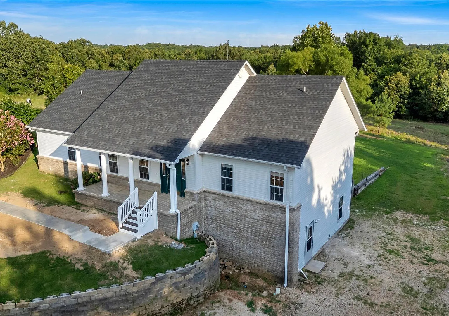 Spacious 5-Bedroom Home on 1.5+ Acres in West Side School District — Photo 3