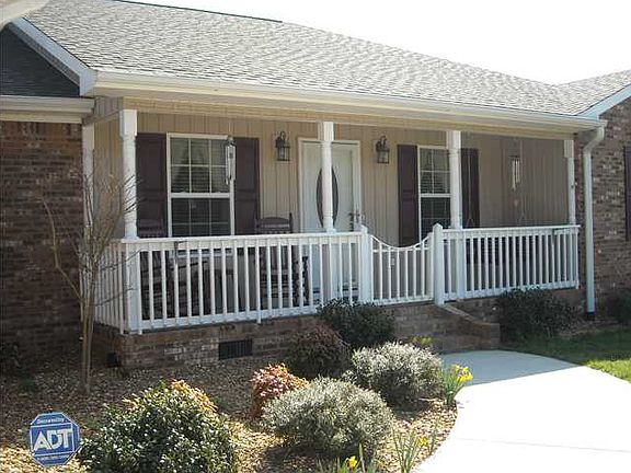 ROCKING CHAIR COVERED FRONT PORCH