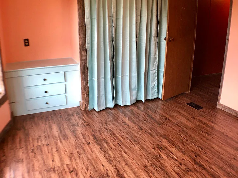 Built-ins and closet in third bedroom.