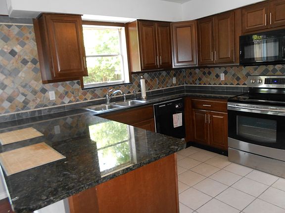 GORGEOUS granite kitchen. 