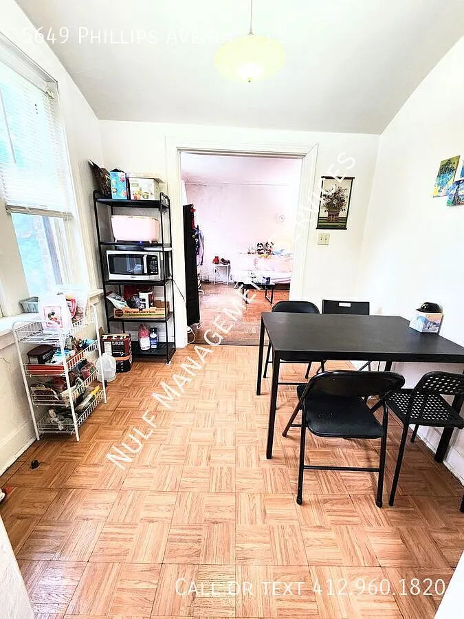Building Photo - 5649 Phillips Ave #11