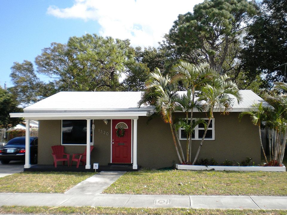 1320 N Andrews Ave - new roof and tinted hurricane impact windows