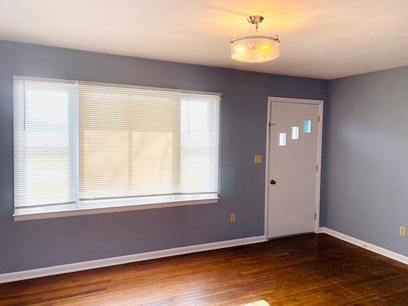 Cozy Living Room with plenty of Sun light