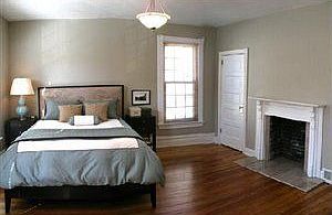 master bedroom.   "her" walk-in closet (not shown).  french doors lead to bath