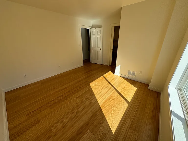 reverse primary bedroom view with ensuite bathroom