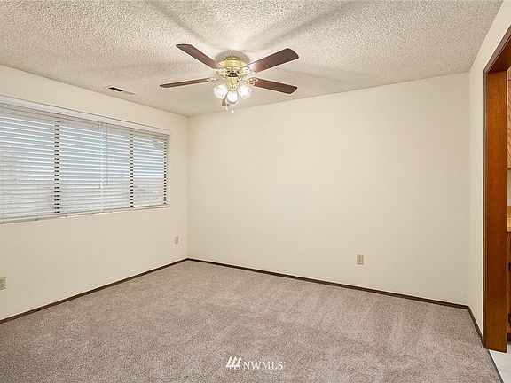 Open concept, Dinning room, kitchen area and family room.  New Stove and Dishwasher, carpet, blinds and interior paint.