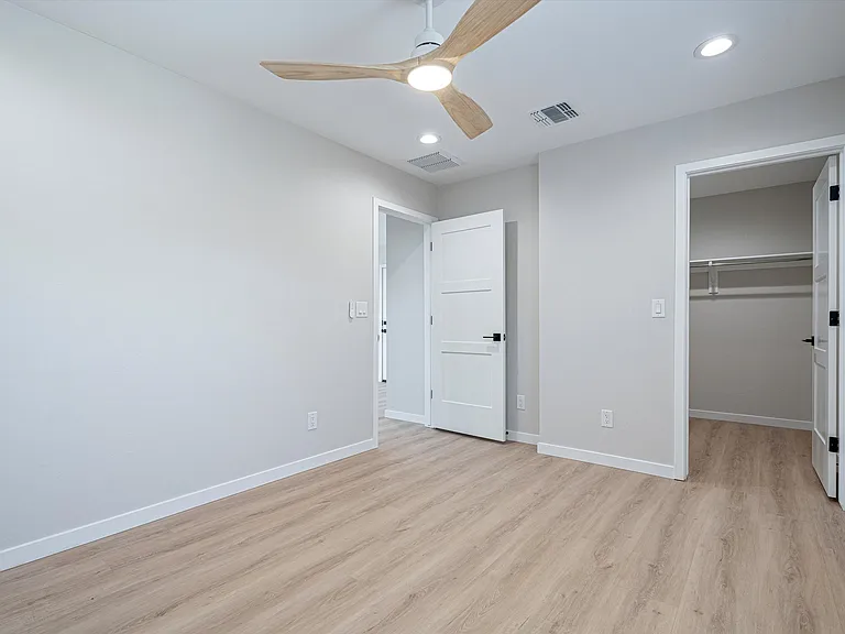 Bedroom 4 Downstairs with Walk In Closet
