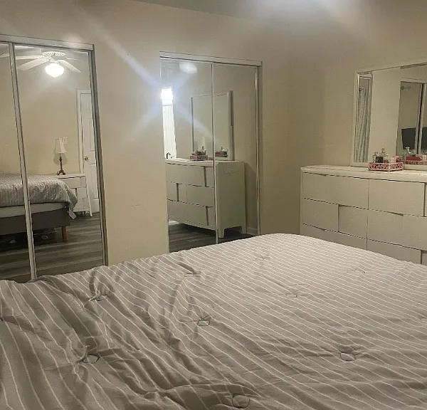 Rear bedroom sliding glass closet doors