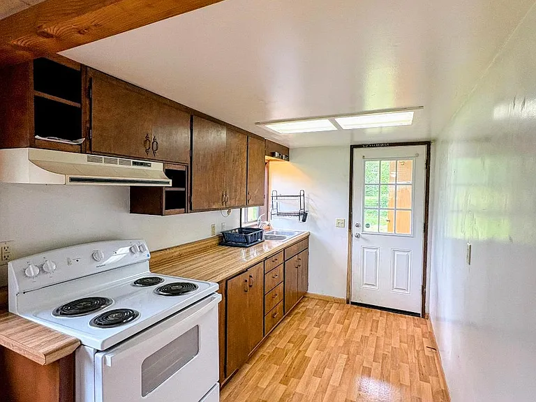 Kitchen with new stove.