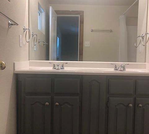 En Suite bathroom with double sinks