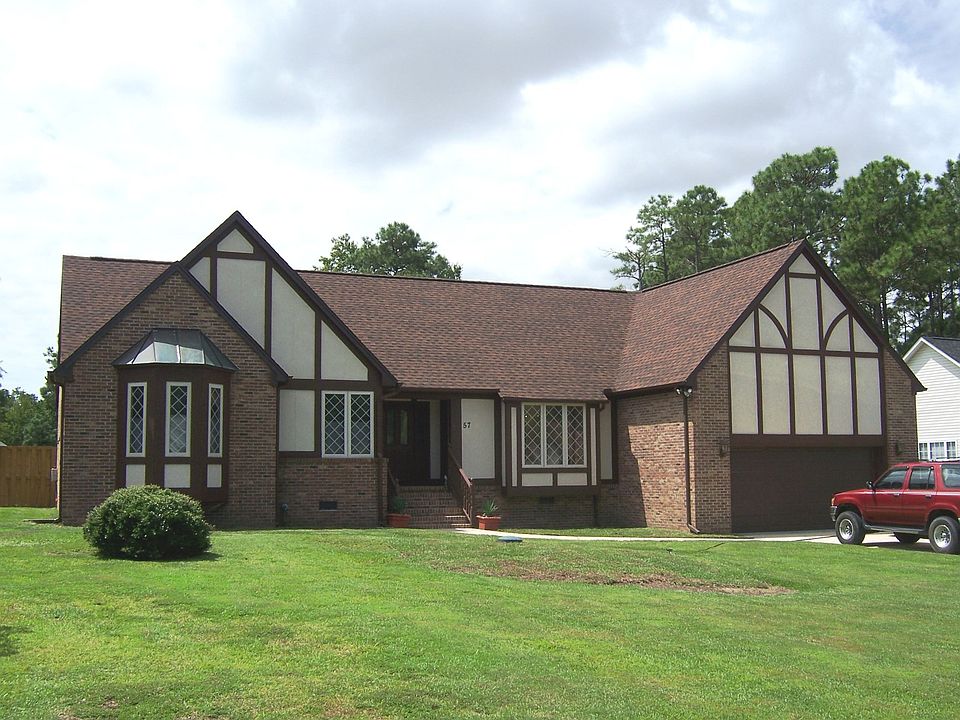 Large tudor style home on the golf course has been remodeled