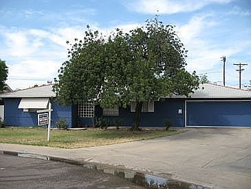 Front view on home located on interior lot w/ rv parking