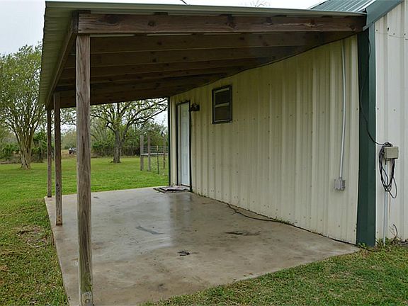 OVERHAND AREA COVERING THE ENTRY DOOR