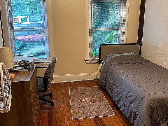 Bedroom number two Furnished with a dresser, bed and desk