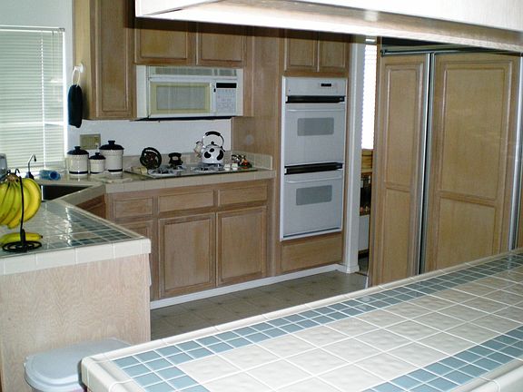 kitchen-built in fridge, tile insets