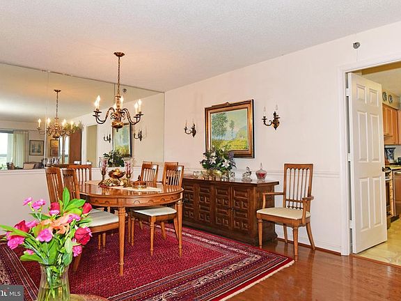 Dining/living/den/hall --gleaming hardwoods!