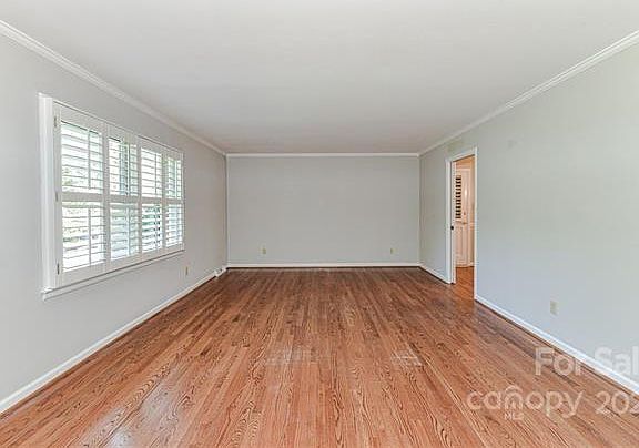 Living Room located in the front of the house. Beautiful views of the large front yard.