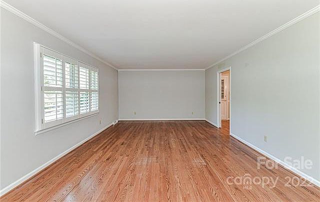Living Room located in the front of the house. Beautiful views of the large front yard.