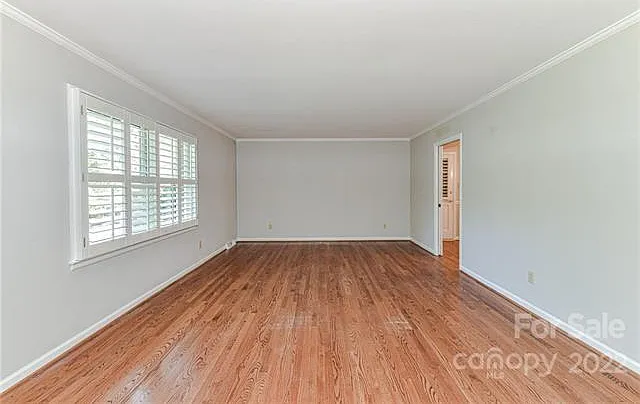 Living Room located in the front of the house. Beautiful views of the large front yard.
