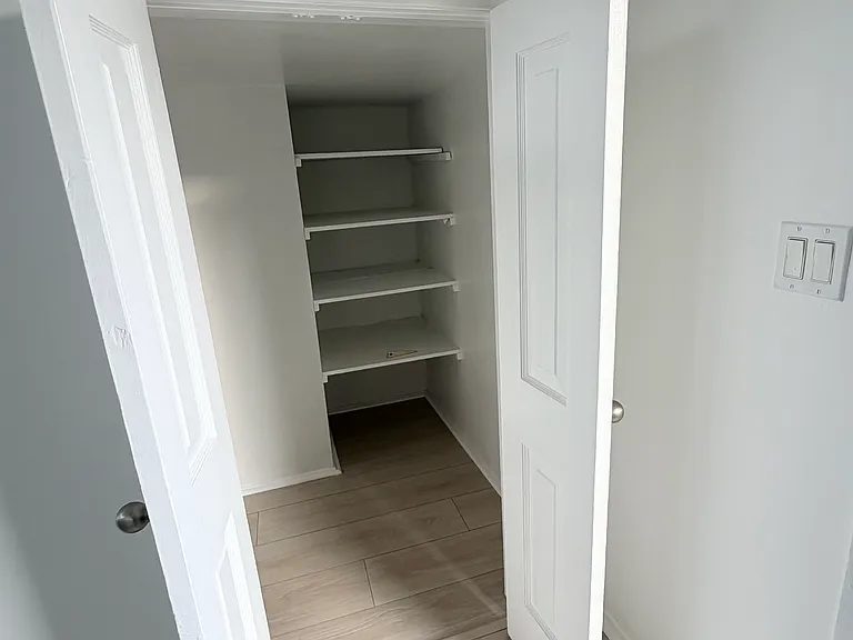 Shoe storage/pantry by the entrance