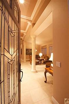Gorgeous grand entry, etched glass door, rotunda entry, art niches, pillars. Welcome home!