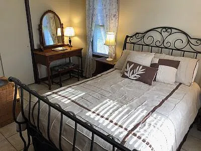 First floor full size bed, vanity, closet