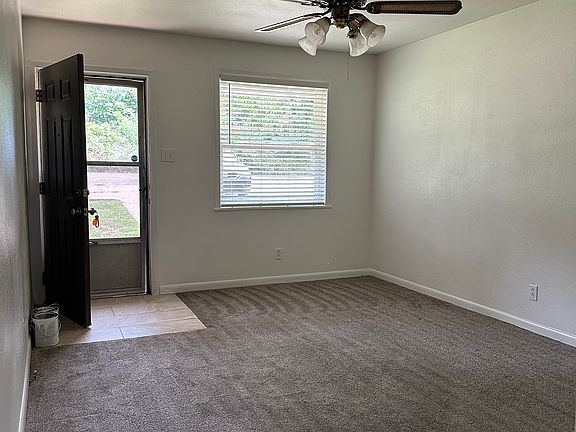 Welcome home. This is the freshly painted living room.