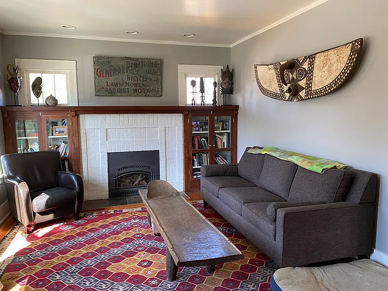 Gas insert in the fireplace, original built ins, mantle and fir floors