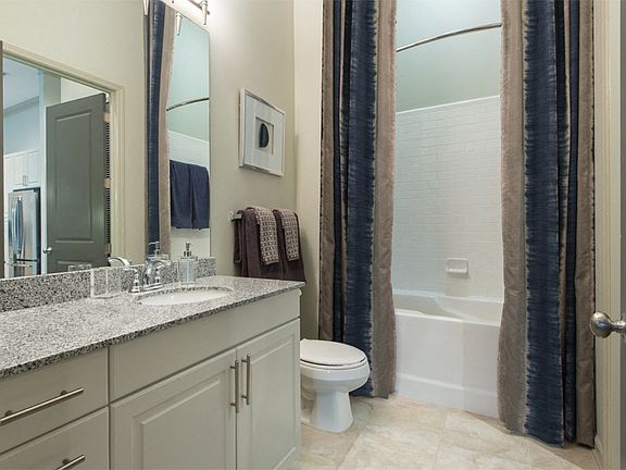 Baths with granite countertops and soaking tubs