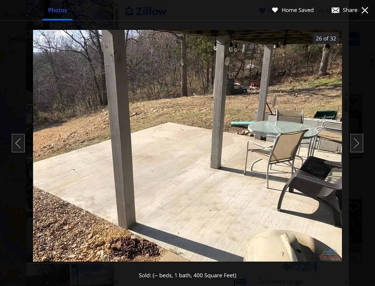 downstairs patio with view of lake. - Plum St