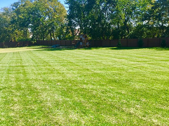 Fenced in 2 acre lot