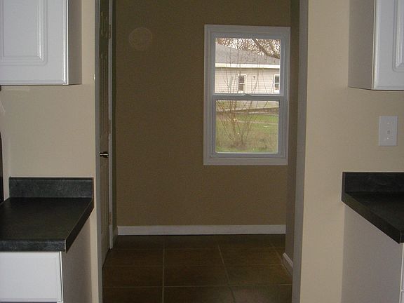 Large mudroom with 18" ceramic tile.