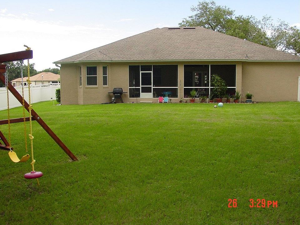 Back of home from backyard