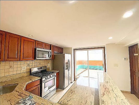 2nd image of 5566 61st St #1