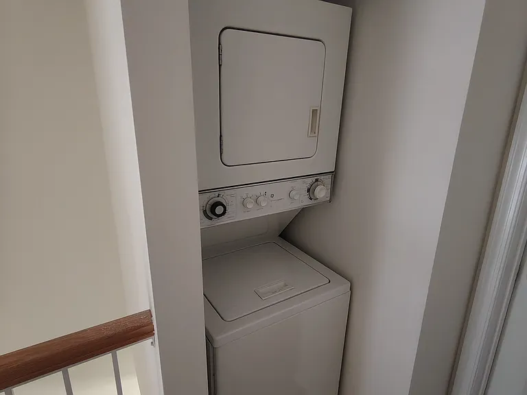 Home features a dedicated laundry area with a full washer and dryer setup.