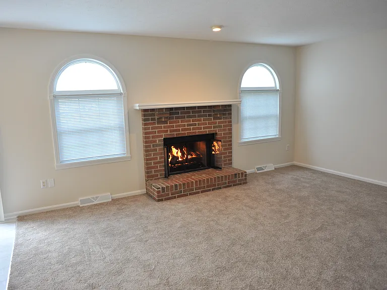 Great room fireplace view from hallway