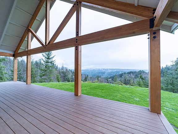 Phenomenal territorial views with Mt. Walker and the Cascade Mountains as the backdrop. Outdoor covered area is meant for entertaining rain or shine!
